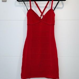 Bebe racerback bandage dress, small stain (front)